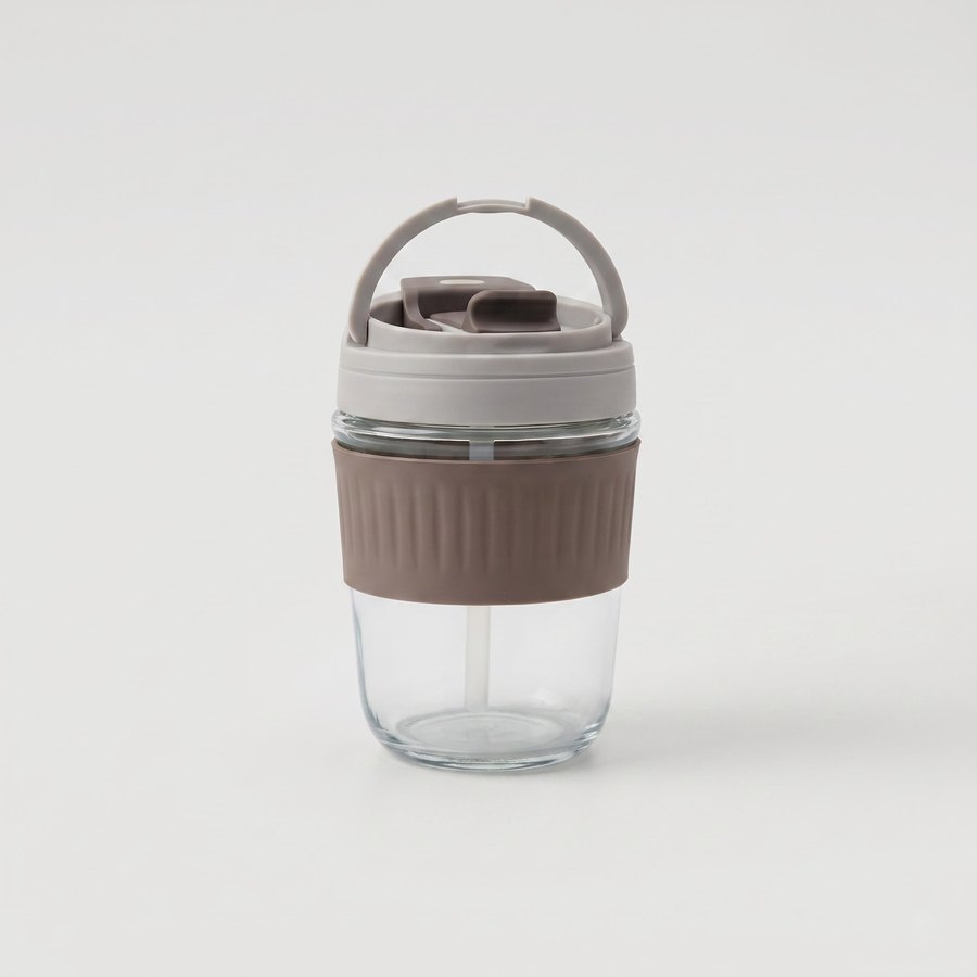 Glass tumbler with sipper lid